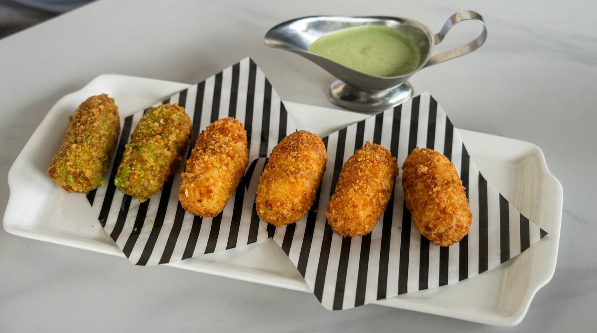 Start with the croquetas